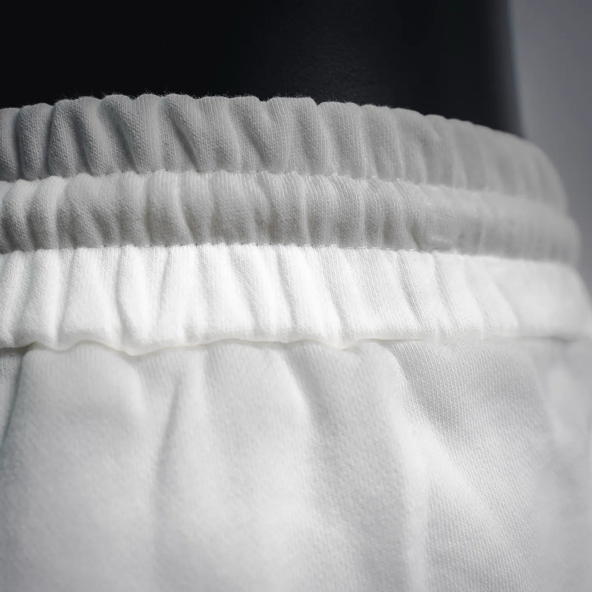 White elastic waistband on Dior cotton drawstring shorts
