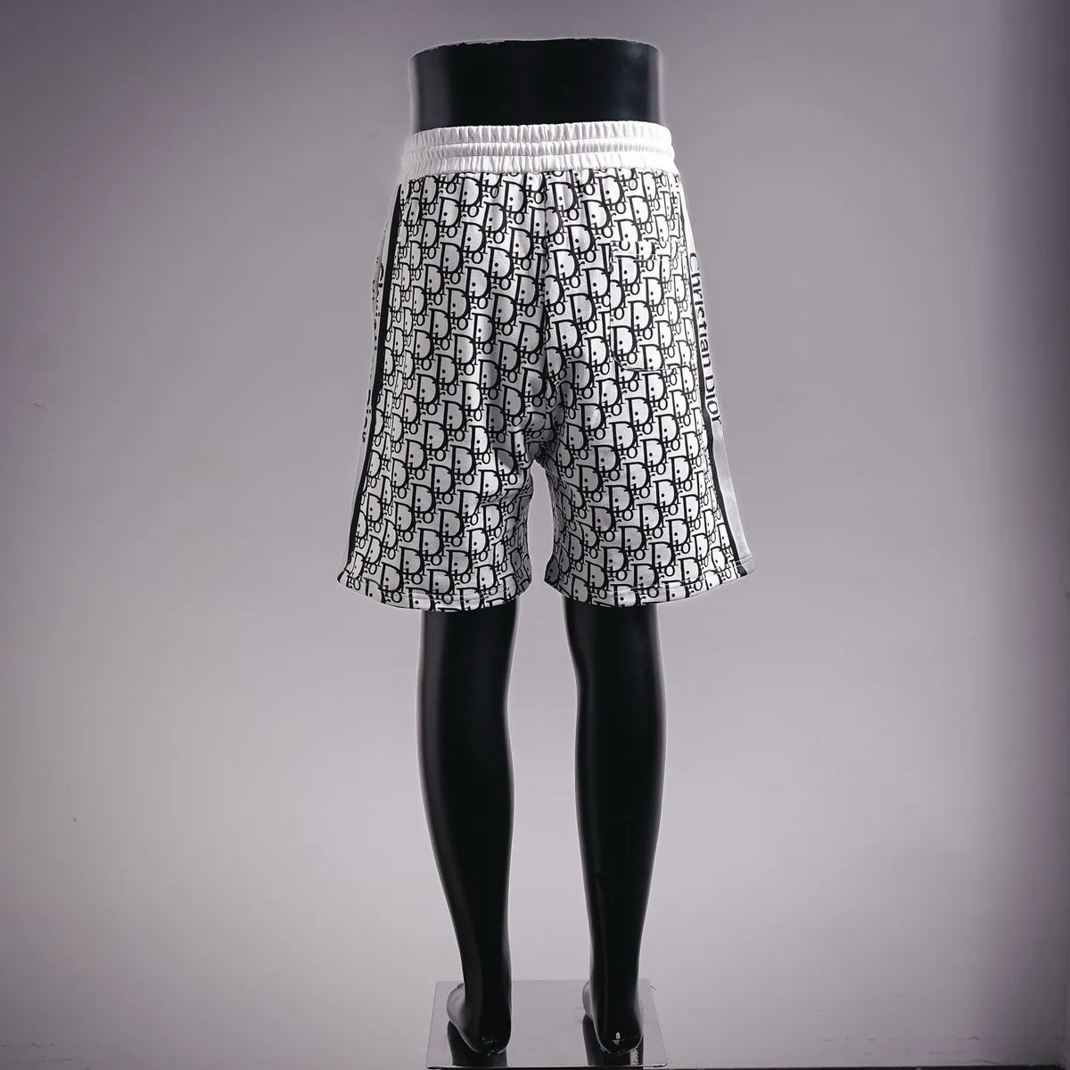 Dior allover logo-print shorts with elastic waist and knee-length relaxed fit