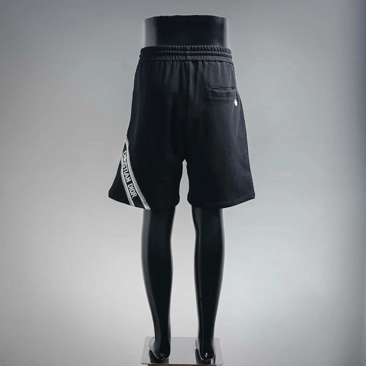 Dior black drawstring shorts with side logo tape, side view