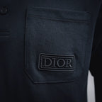 Dior polo chest pocket logo patch on dark navy knit fabric