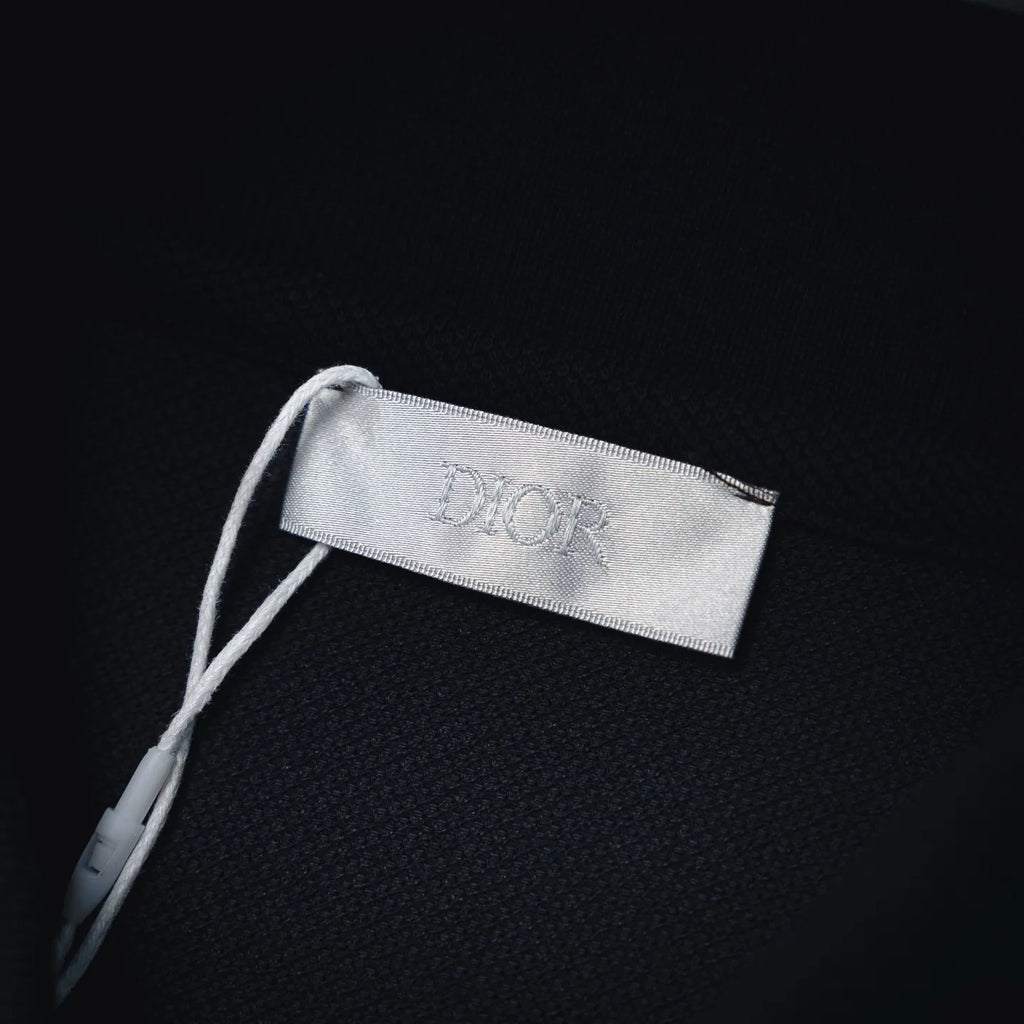 Dior polo neck label tag on dark navy inner collar
