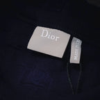 Dior brand label on dark blue short-sleeve knit shirt inner tag