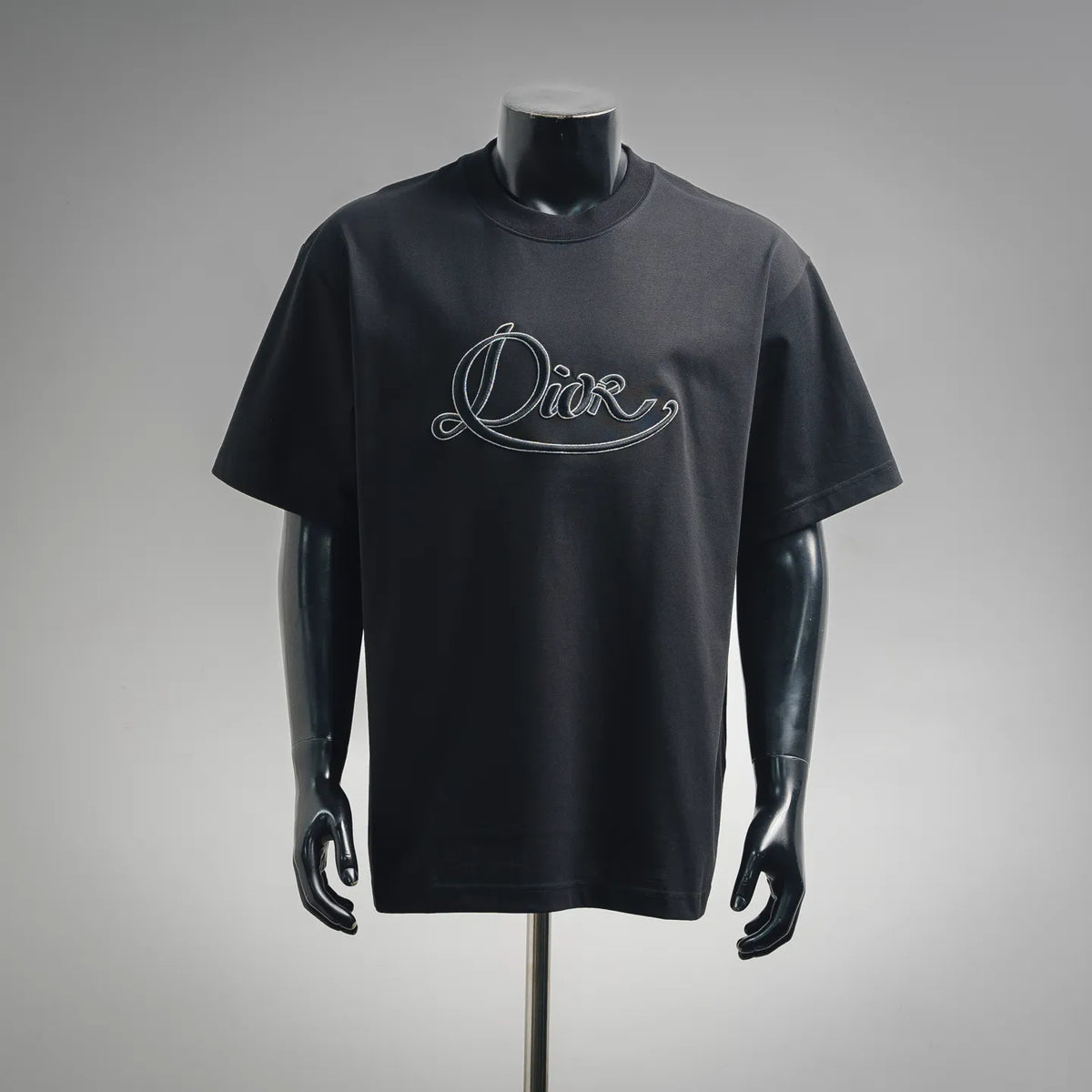 Dior short-sleeve T-shirt in dark fabric with embroidered script logo at chest