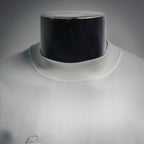White Dior crewneck T-shirt neckline with ribbed collar close-up