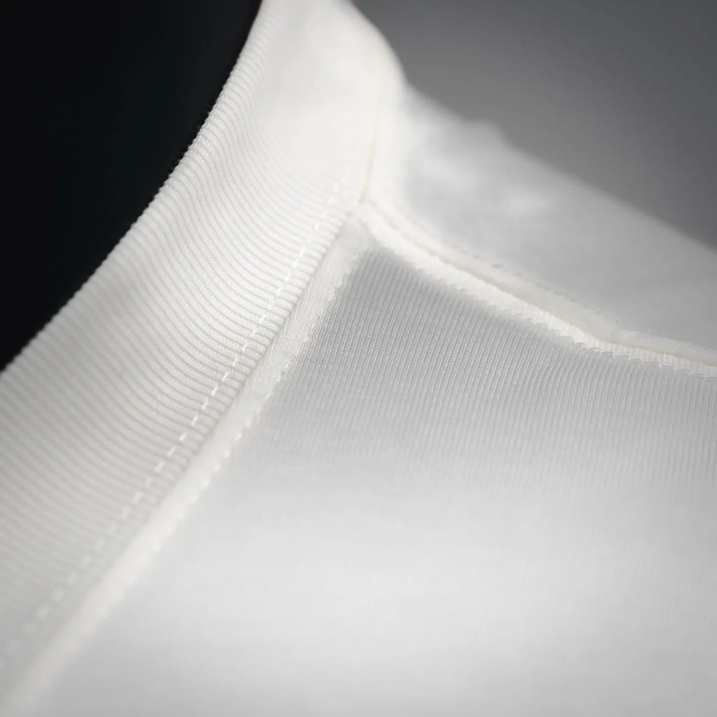 White Dior crewneck T-shirt fabric seam and stitching close-up