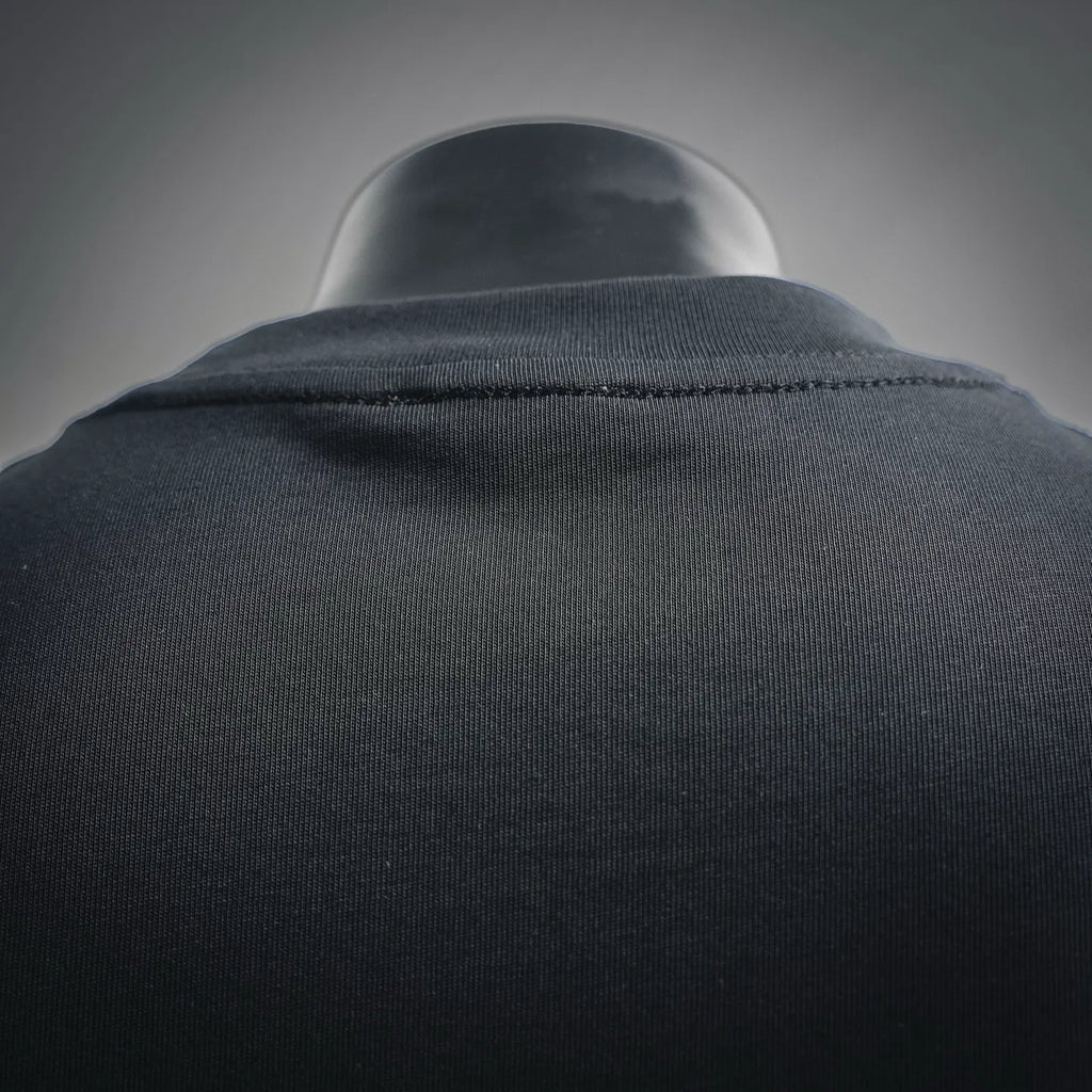 Black T-shirt back yoke seam with stitched neckline