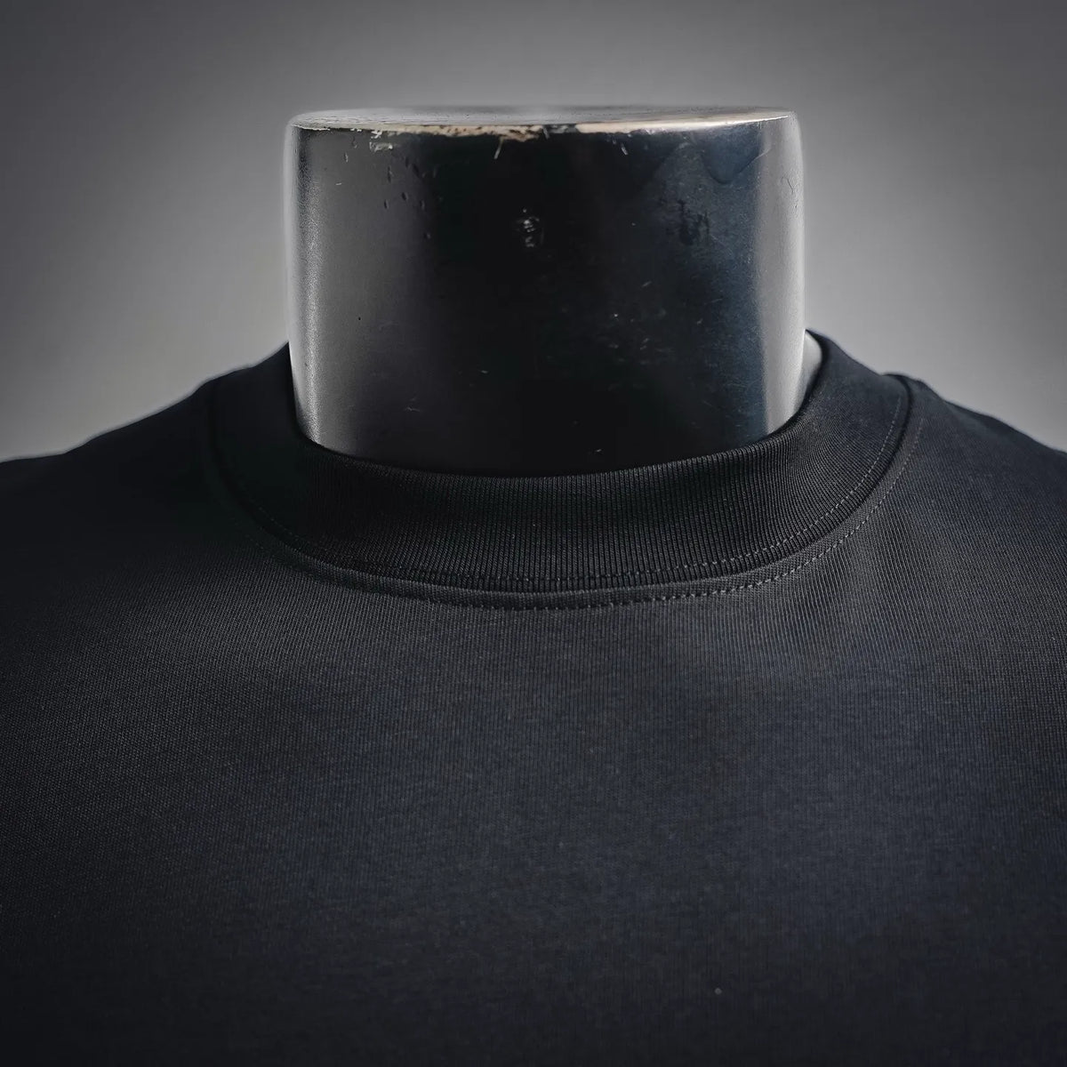 Black Dior crewneck T-shirt neckline close-up