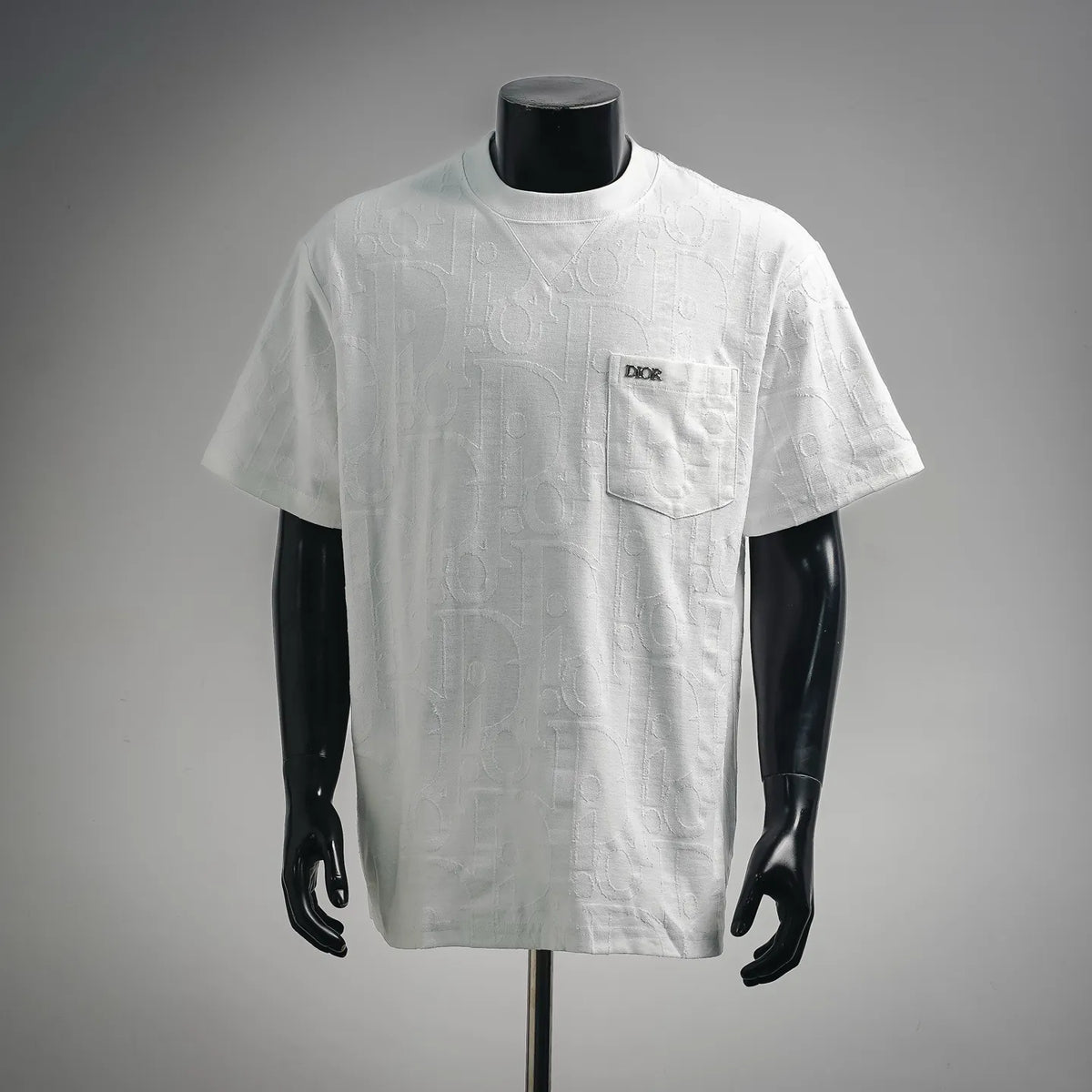 White Dior short-sleeve crewneck T-shirt with textured logo pattern and chest pocket