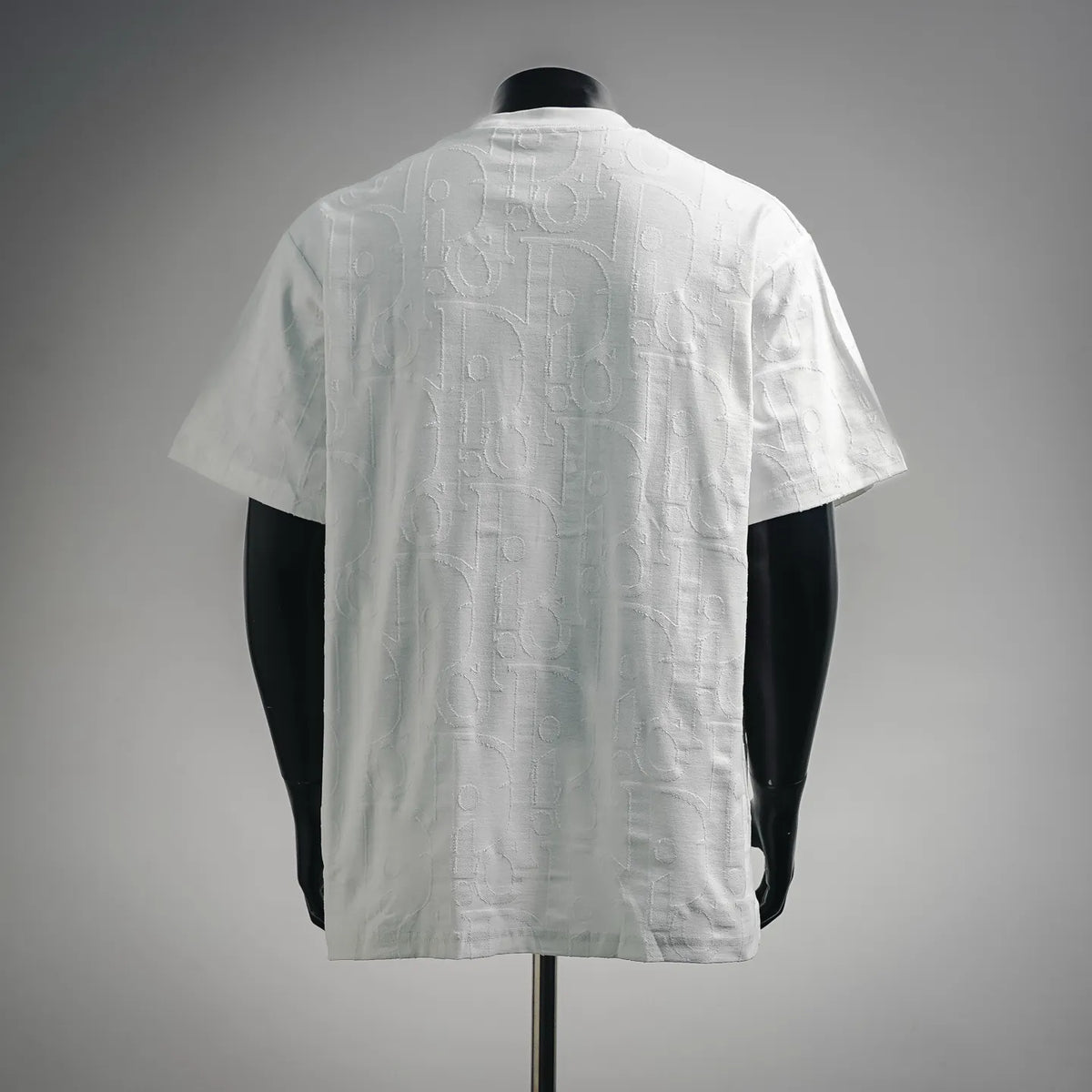 White Dior short-sleeve crewneck T-shirt, back view with embossed logo pattern
