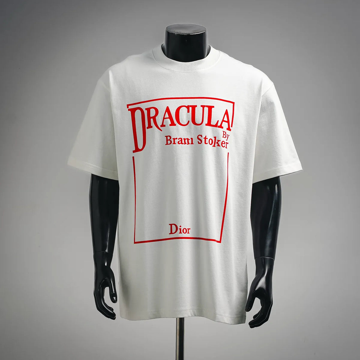 White Dior short-sleeve T-shirt with red Dracula graphic and “Brami Stoker” text