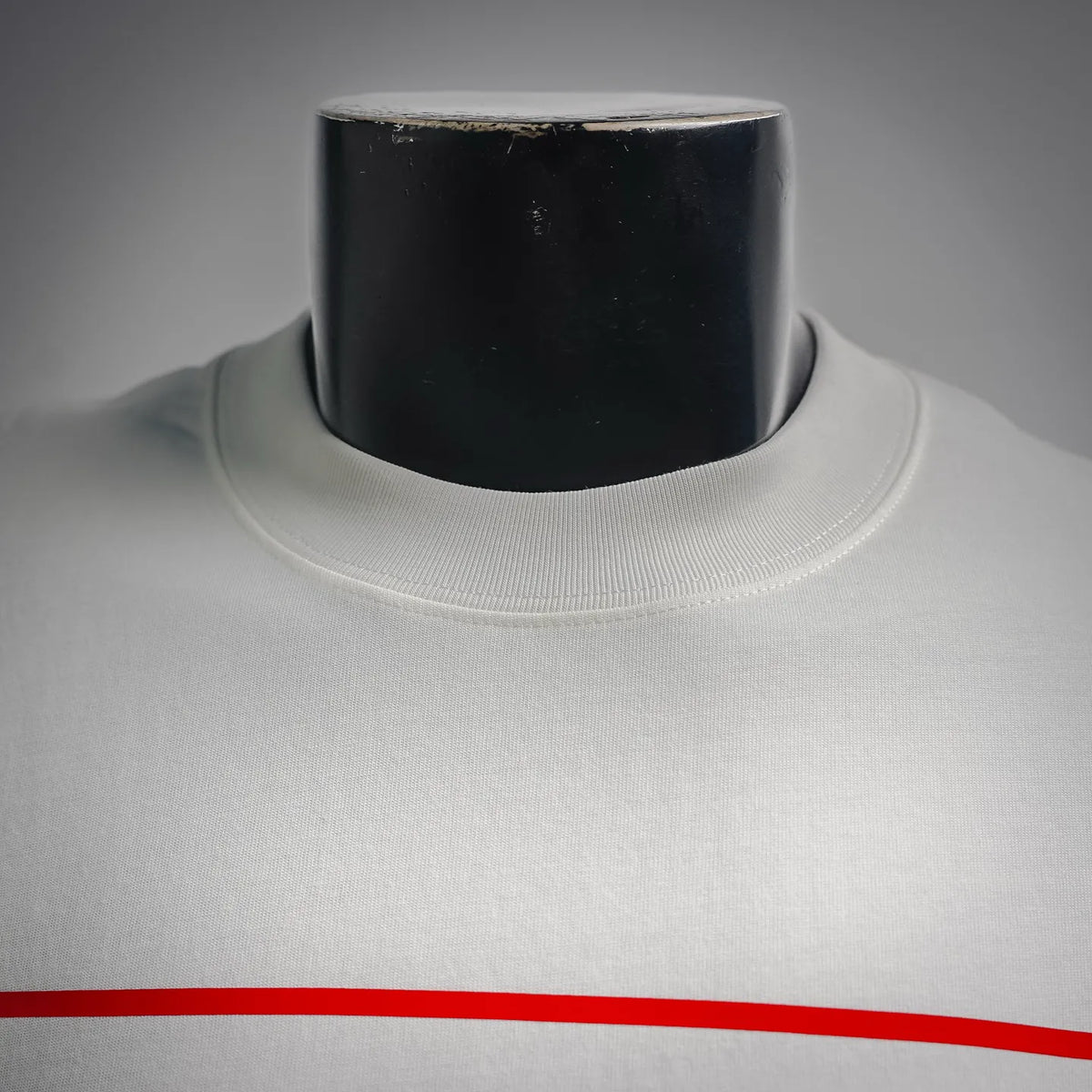 White T-shirt crew neckline with ribbed collar on a mannequin