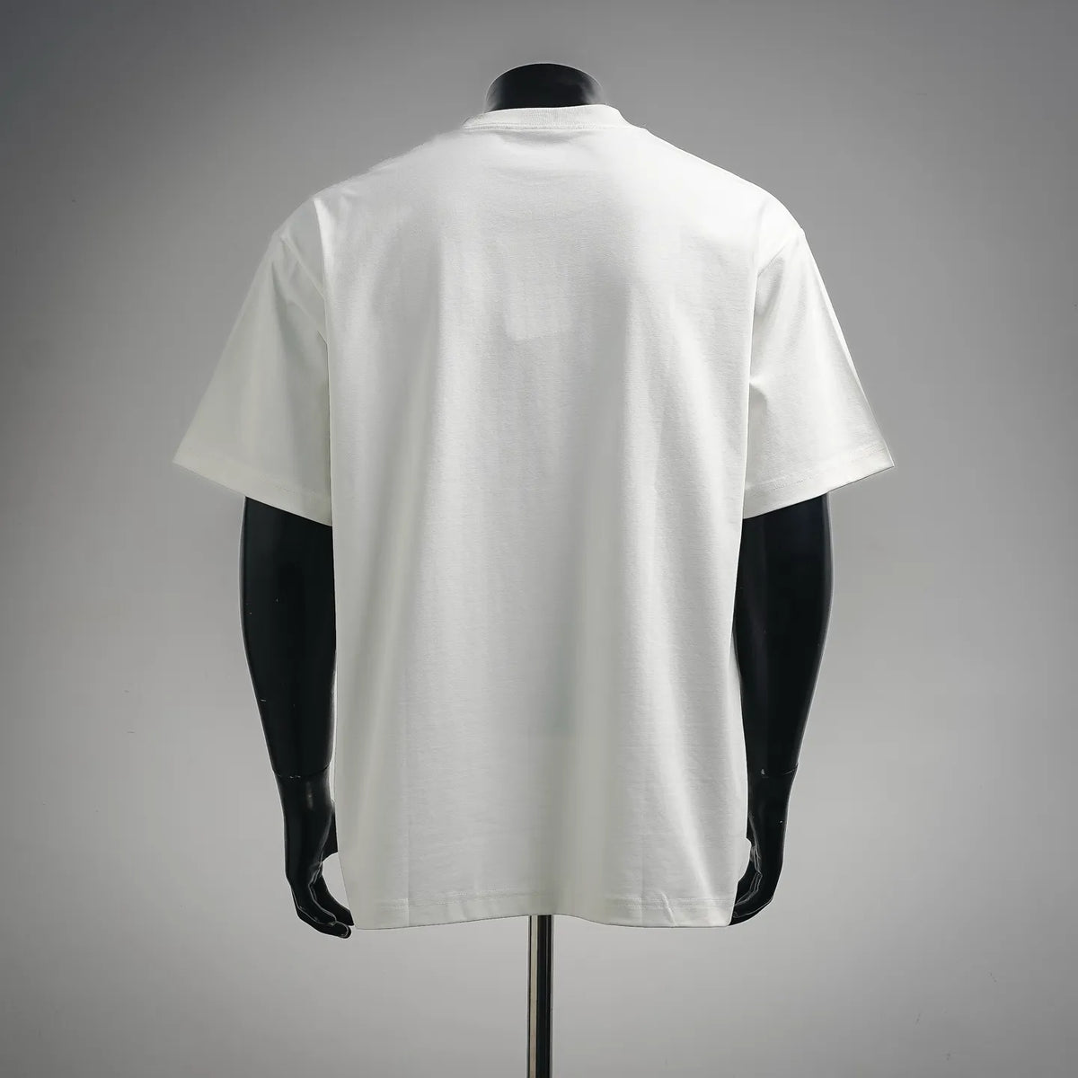 White crewneck T-shirt on a mannequin, back view