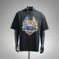 Black short-sleeve T-shirt with large blue and gold crest graphic on the front