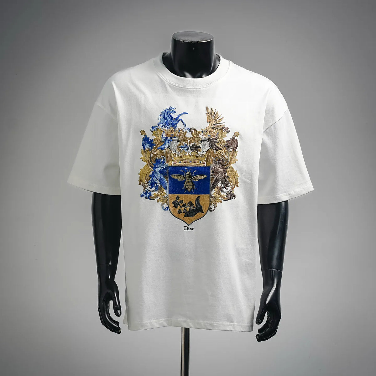 White Dior short-sleeve crewneck T-shirt with large blue and gold crest graphic