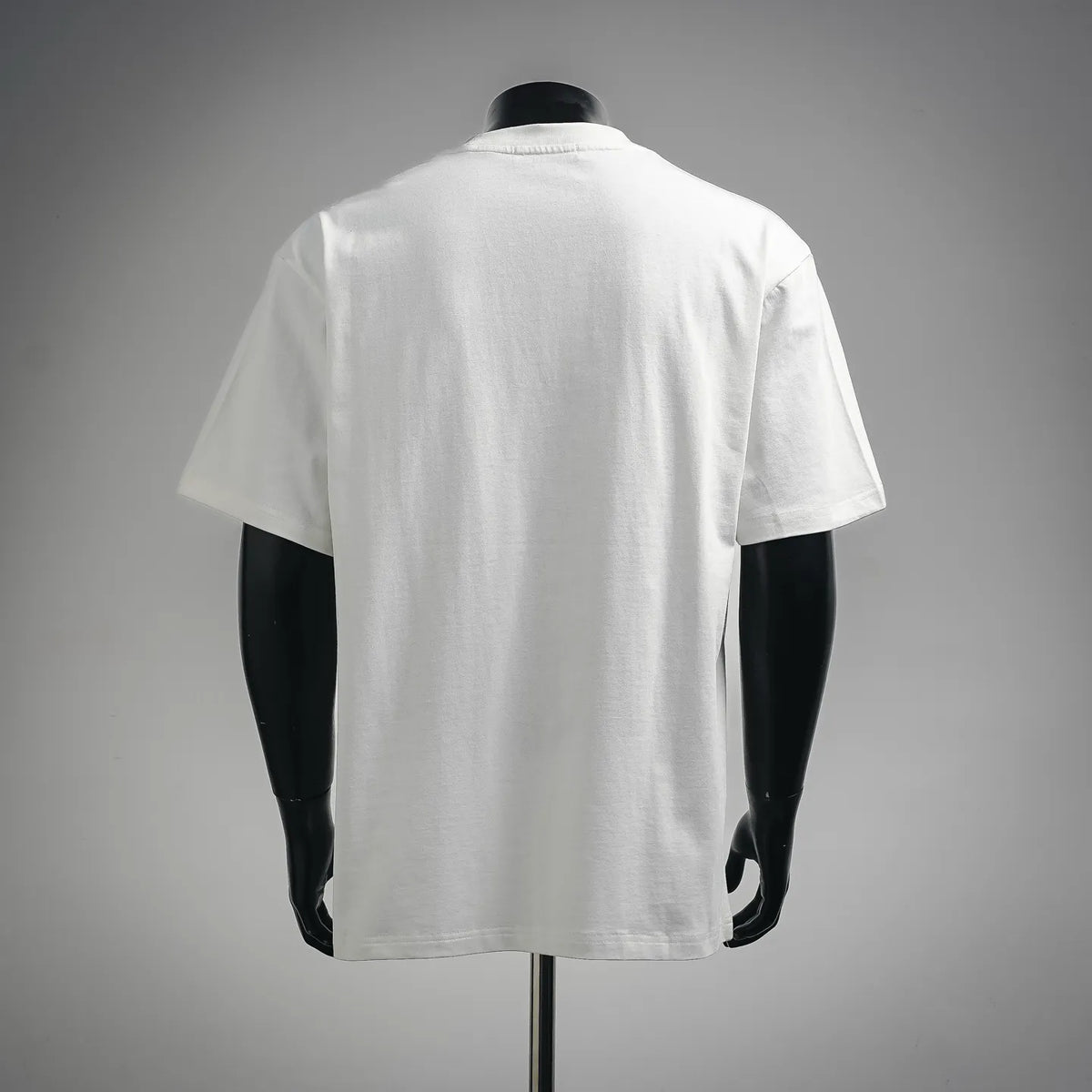 White Dior short-sleeve T-shirt on a mannequin, back view with crew neck