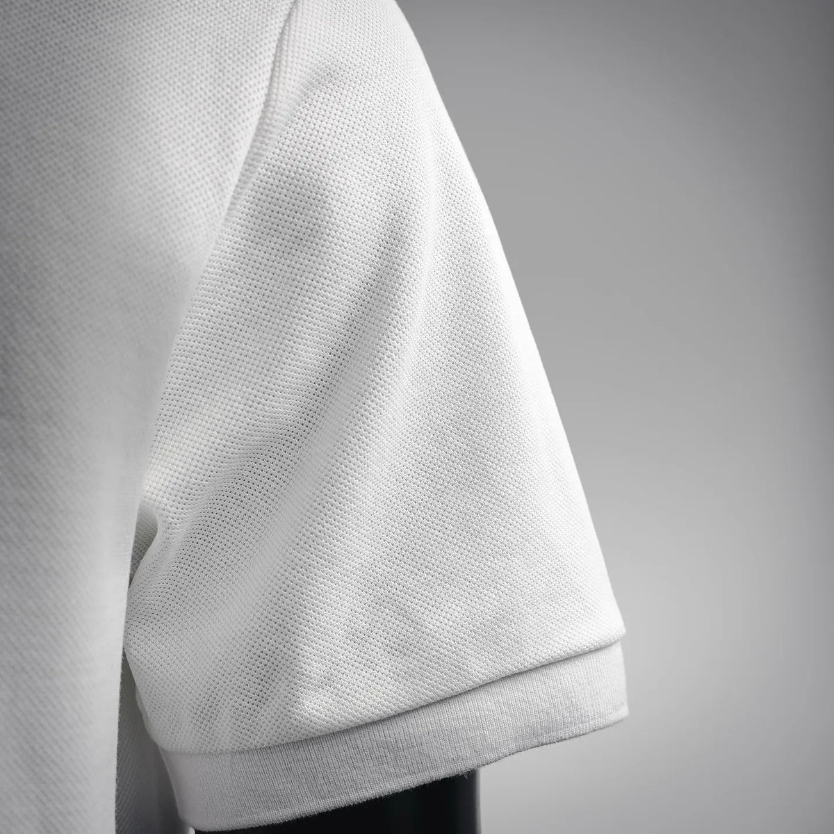 White polo shirt short sleeve in textured fabric