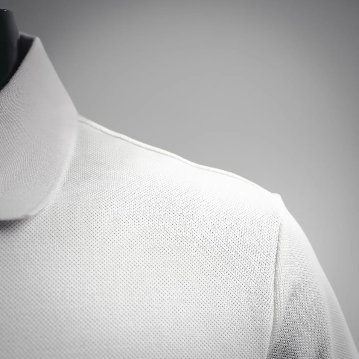 White polo shirt shoulder seam and collar edge