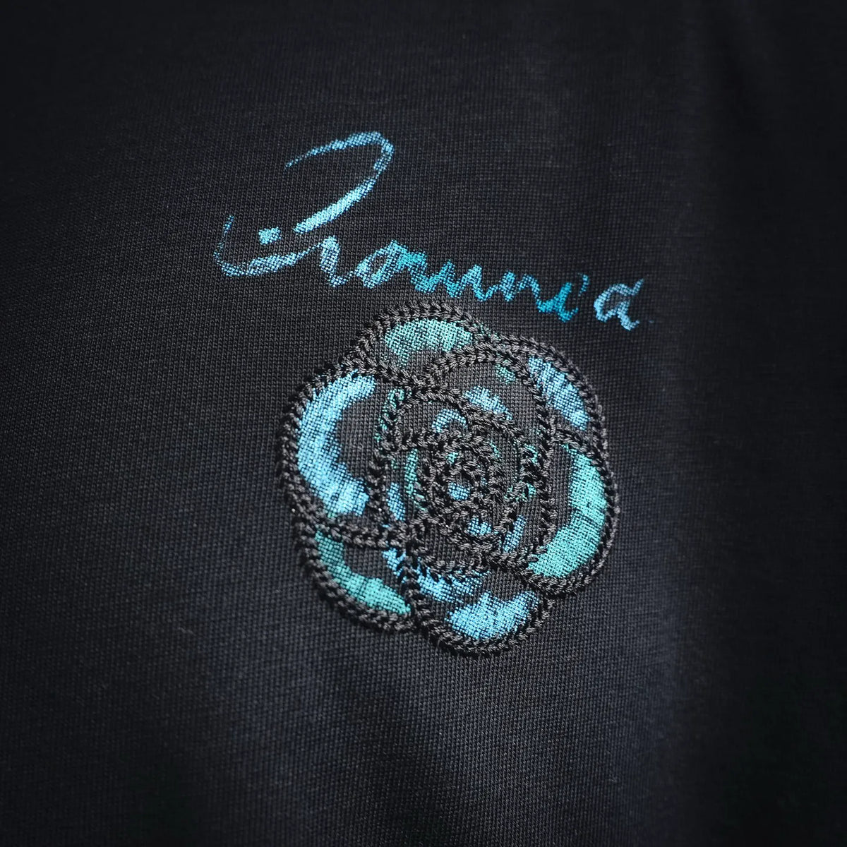 Dior black crewneck T-shirt with small blue embroidered crest detail