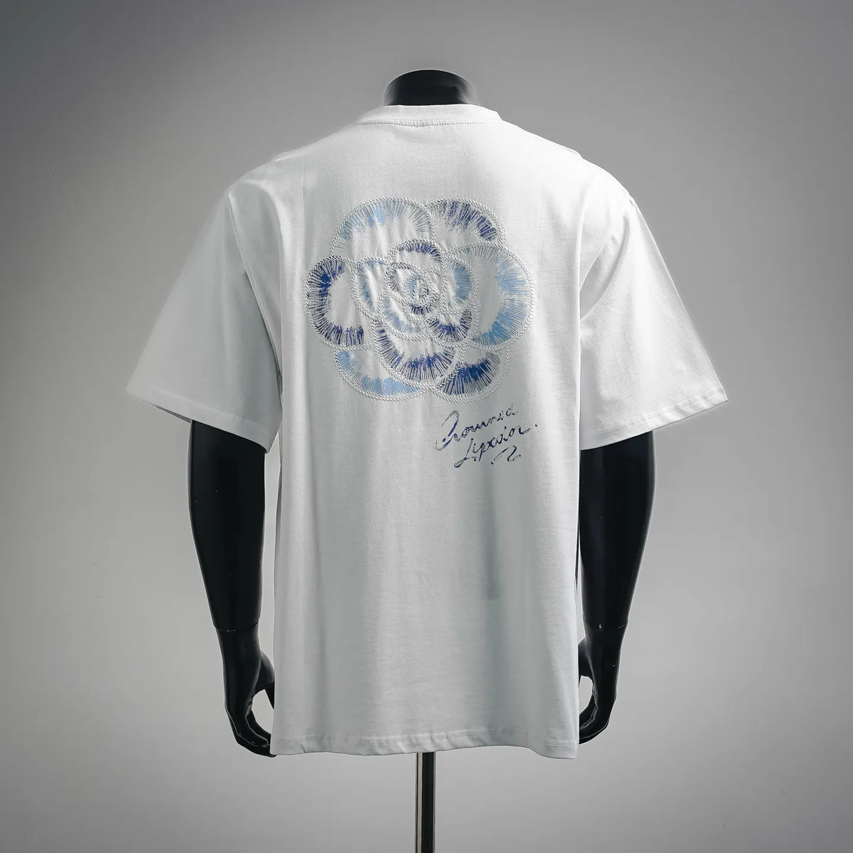 White Dior T-shirt with large blue embroidered back graphic and signature