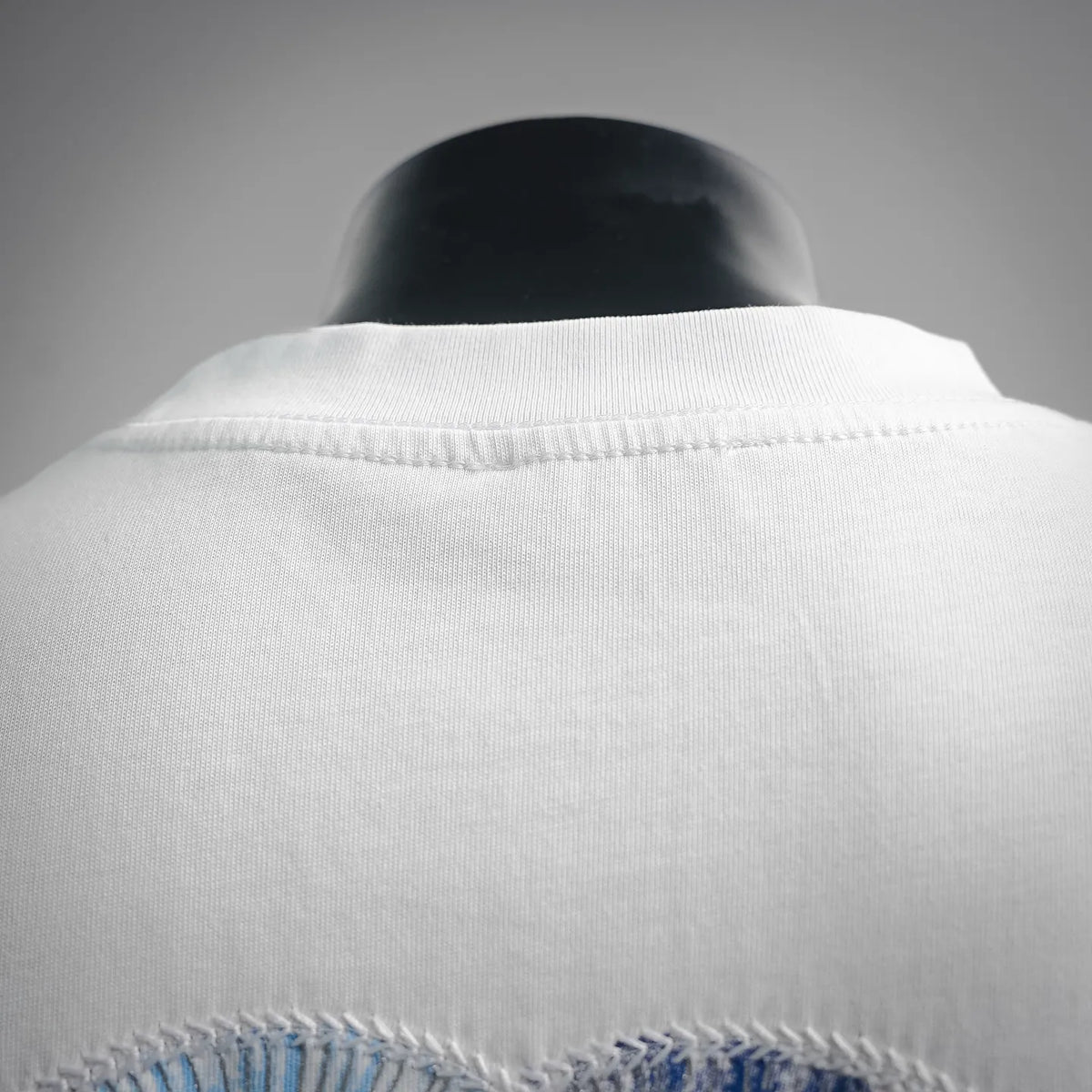 White Dior T-shirt back view with stitched neckline yoke