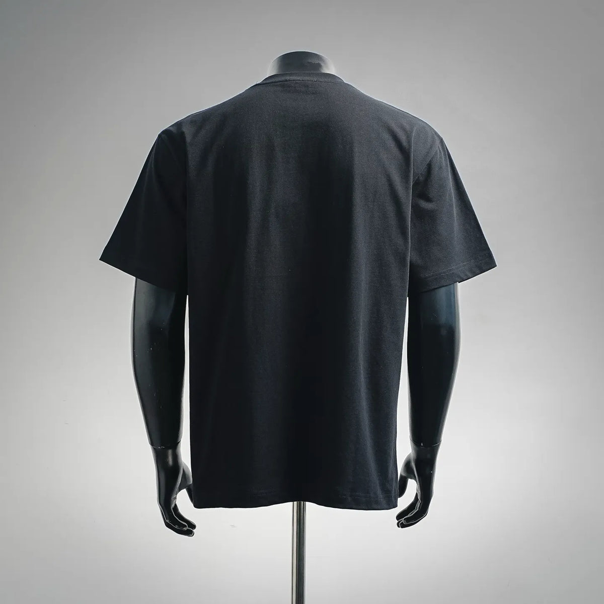 Dior black short-sleeve T-shirt back view, smooth crew neck and short sleeves