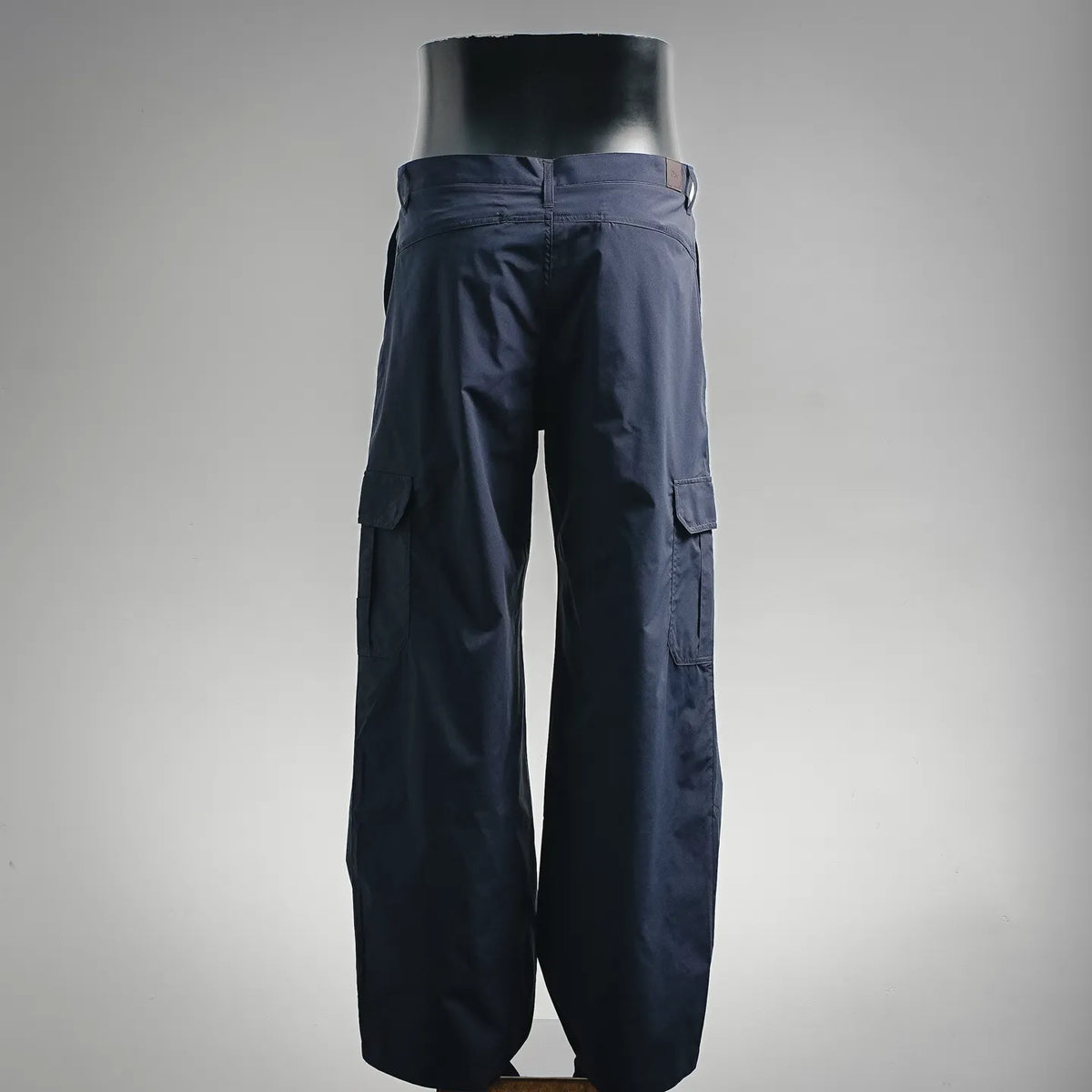 Navy wide-leg cargo pants with side cargo pockets and belt loops