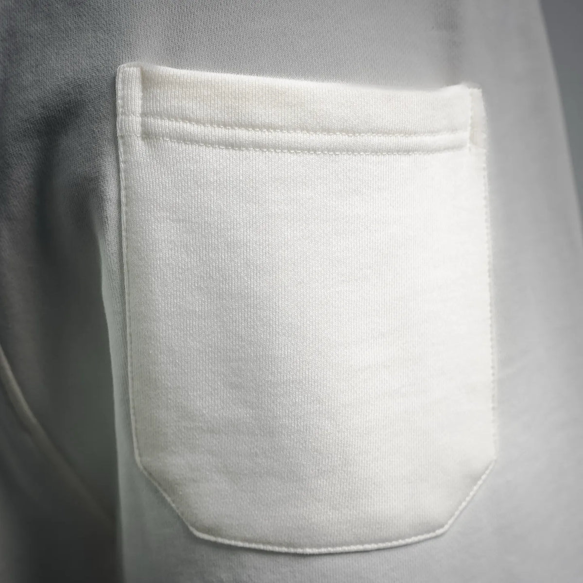White shorts pocket with overstitched edge
