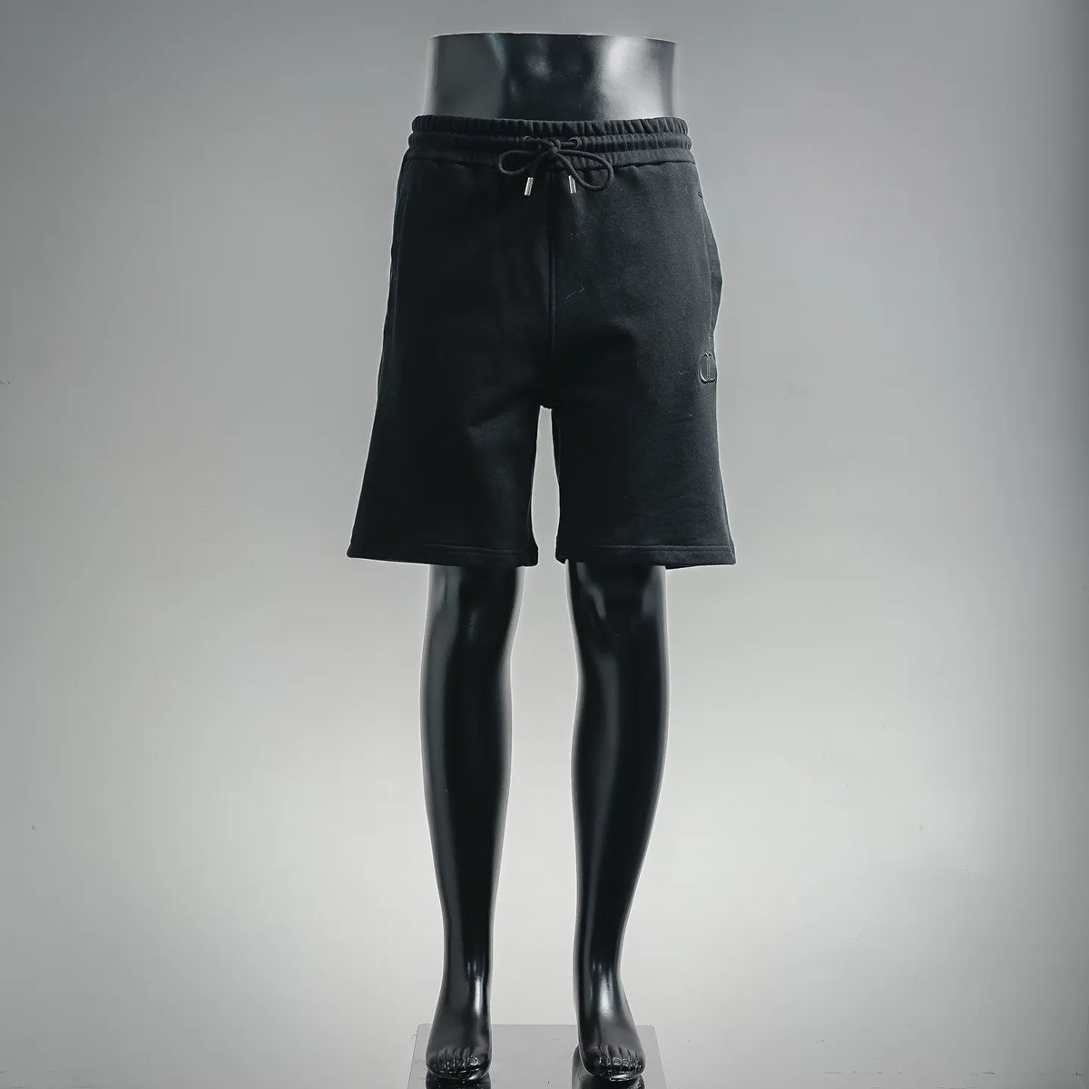 Dior black drawstring shorts with elastic waistband and straight legs