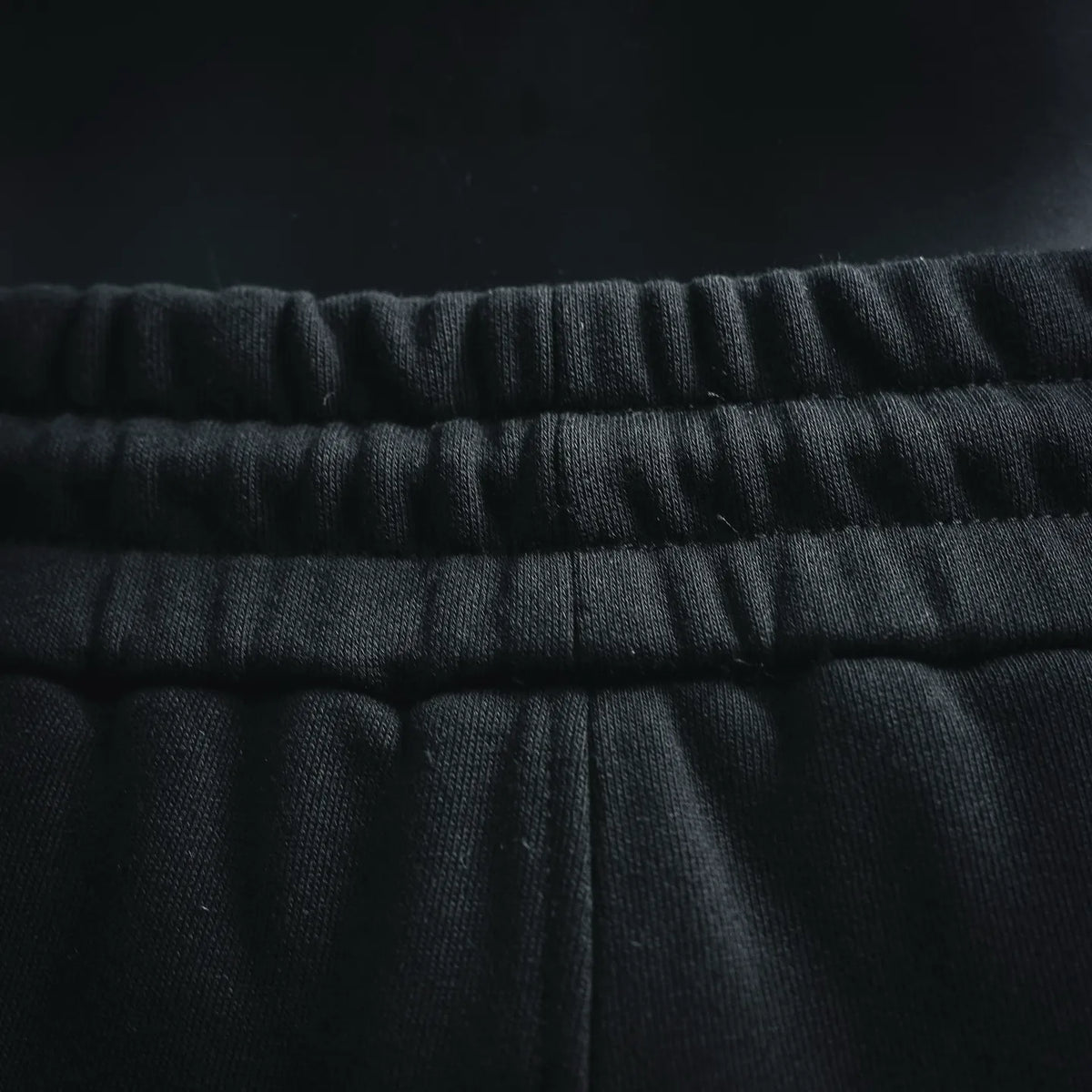 Dior black elastic waistband with gathered fabric texture