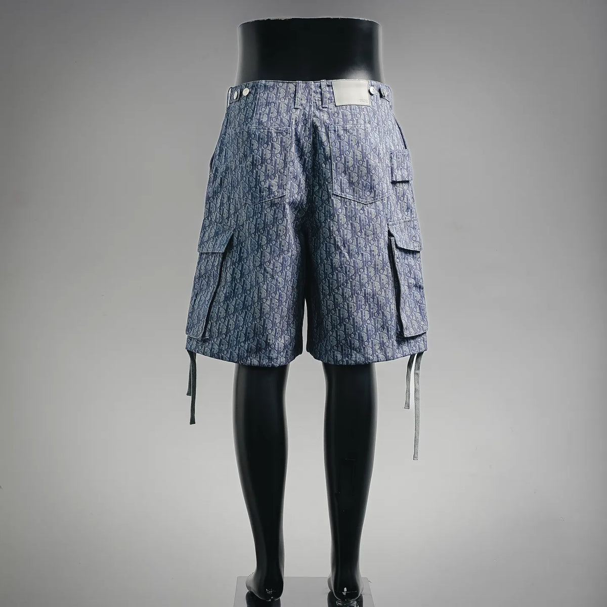 Blue Dior monogram denim shorts with patch pockets and hanging ties
