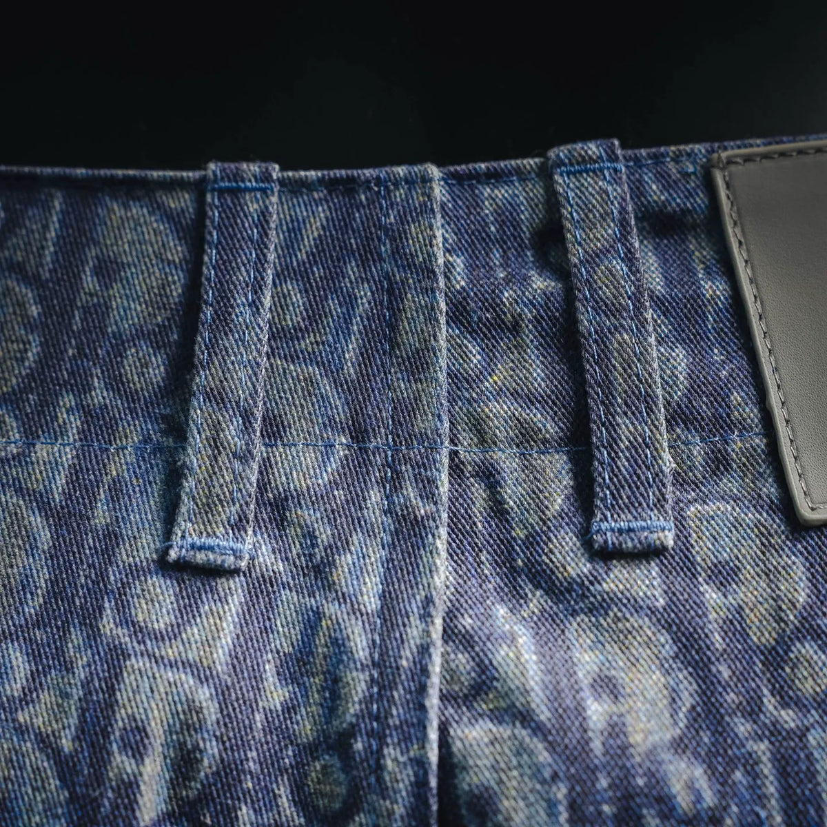 Blue monogram denim shorts with pleated front and cargo pocket flap