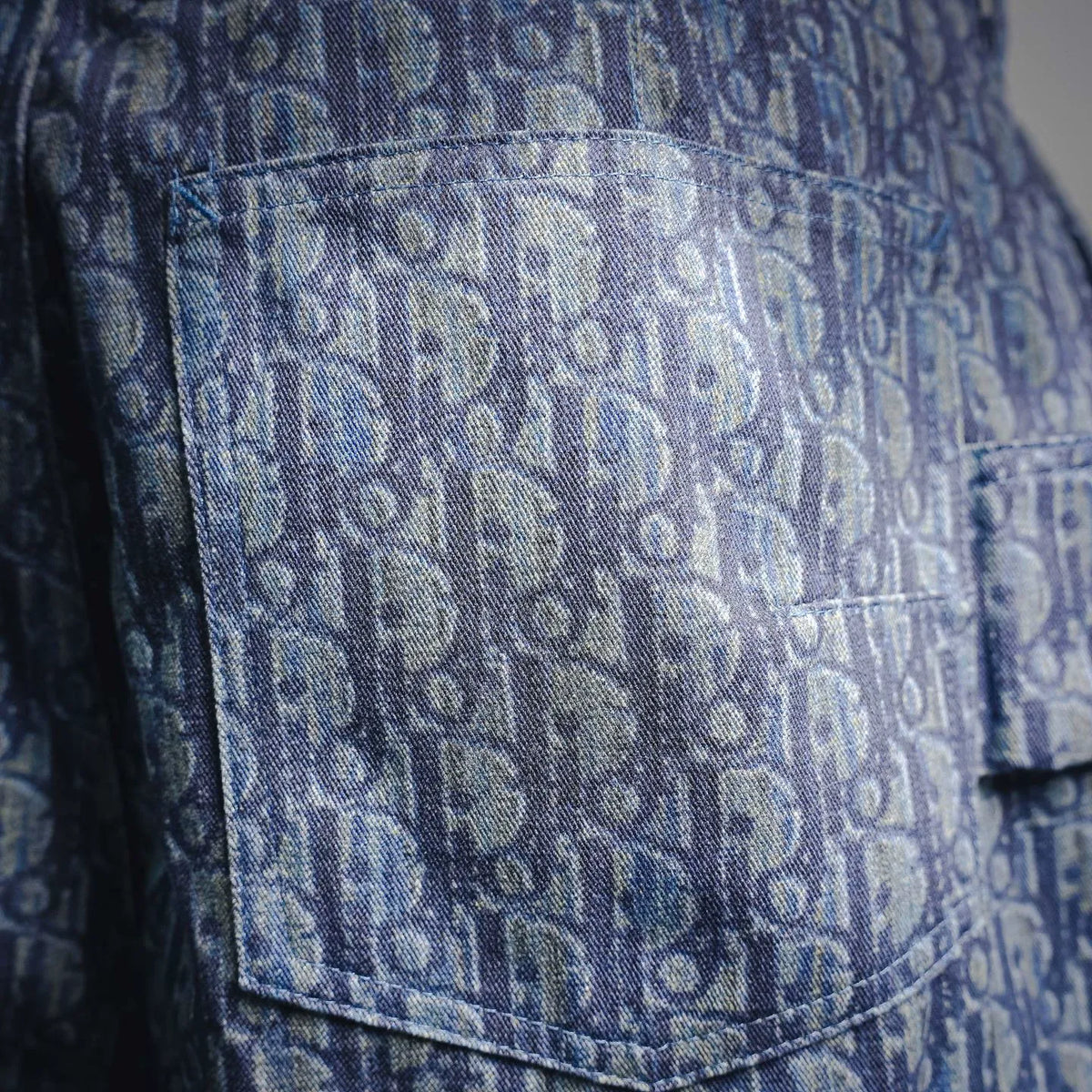 Blue monogram denim shorts with side pocket panel and topstitching