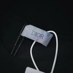 Dior T-shirt neck label close-up with white drawstring detail