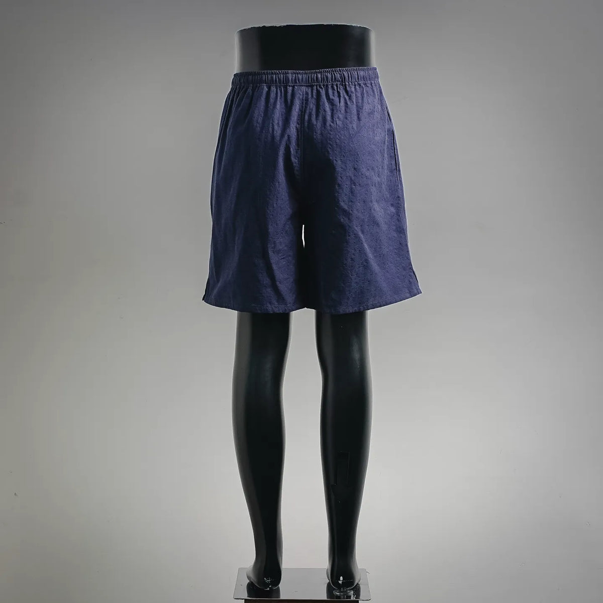 Navy drawstring shorts with elastic waist and relaxed fit