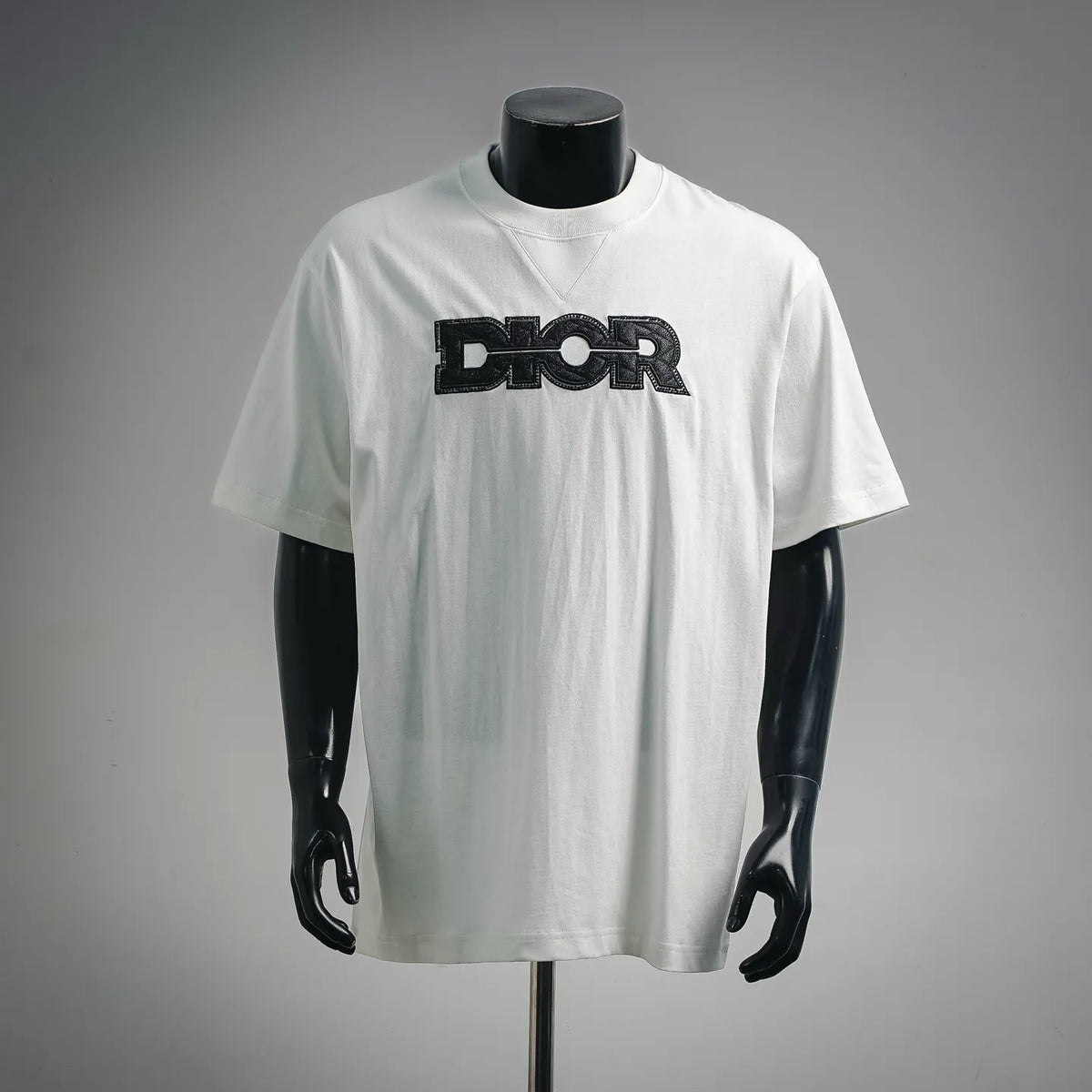 White Dior logo crewneck T-shirt on mannequin, front view