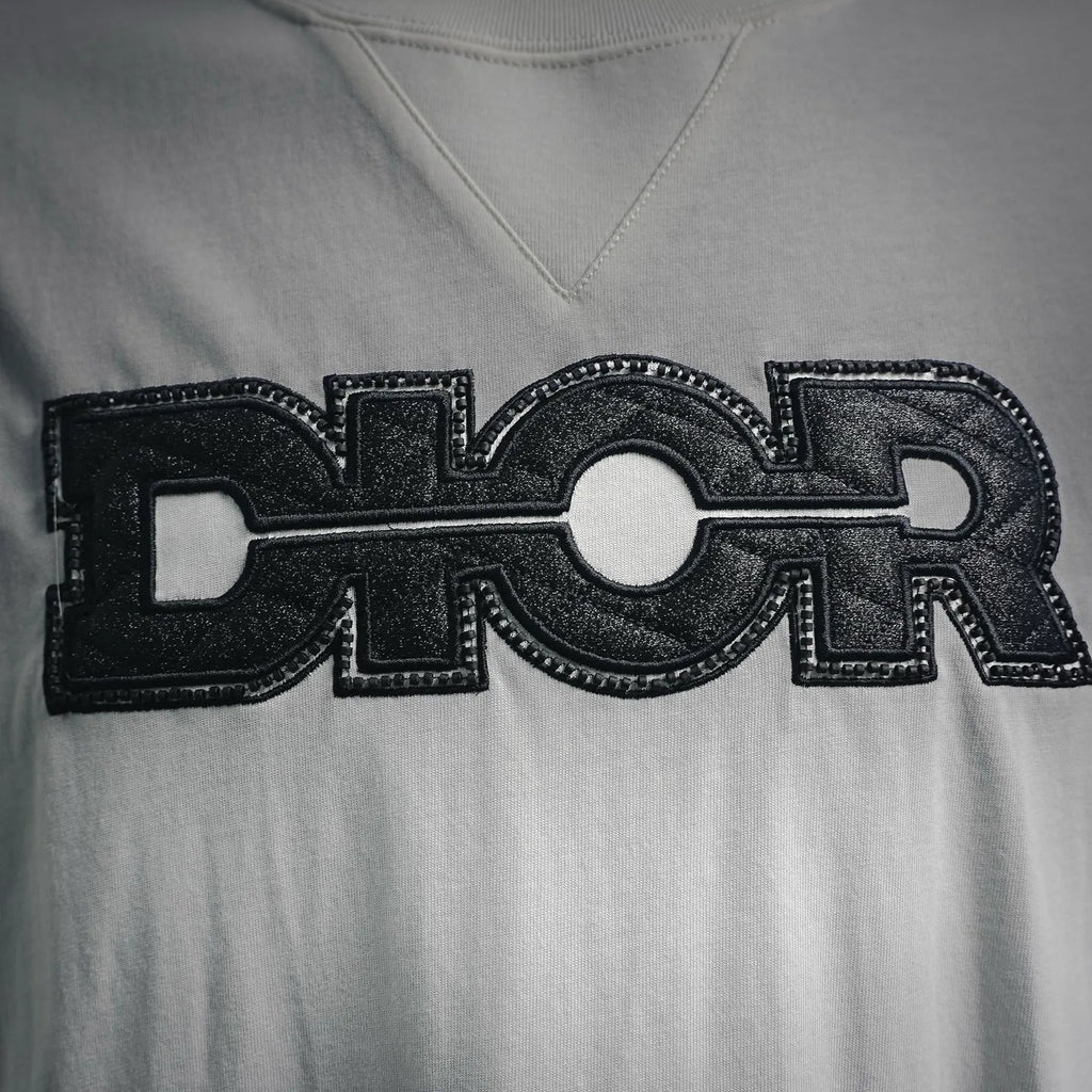 White Dior logo T-shirt front logo detail in black with textured print
