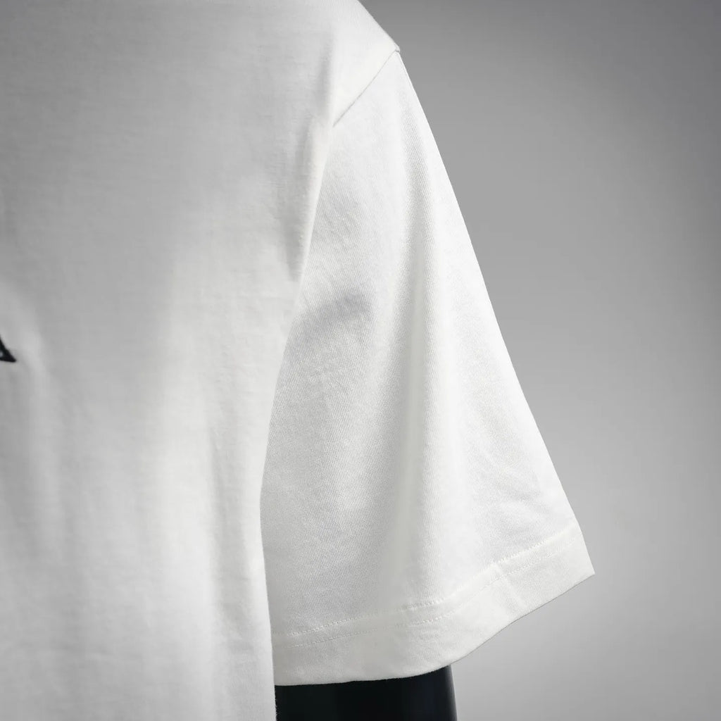 White Dior logo T-shirt short sleeve and side seam close-up