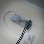 White Dior logo T-shirt interior neck label with brand tag and stitching