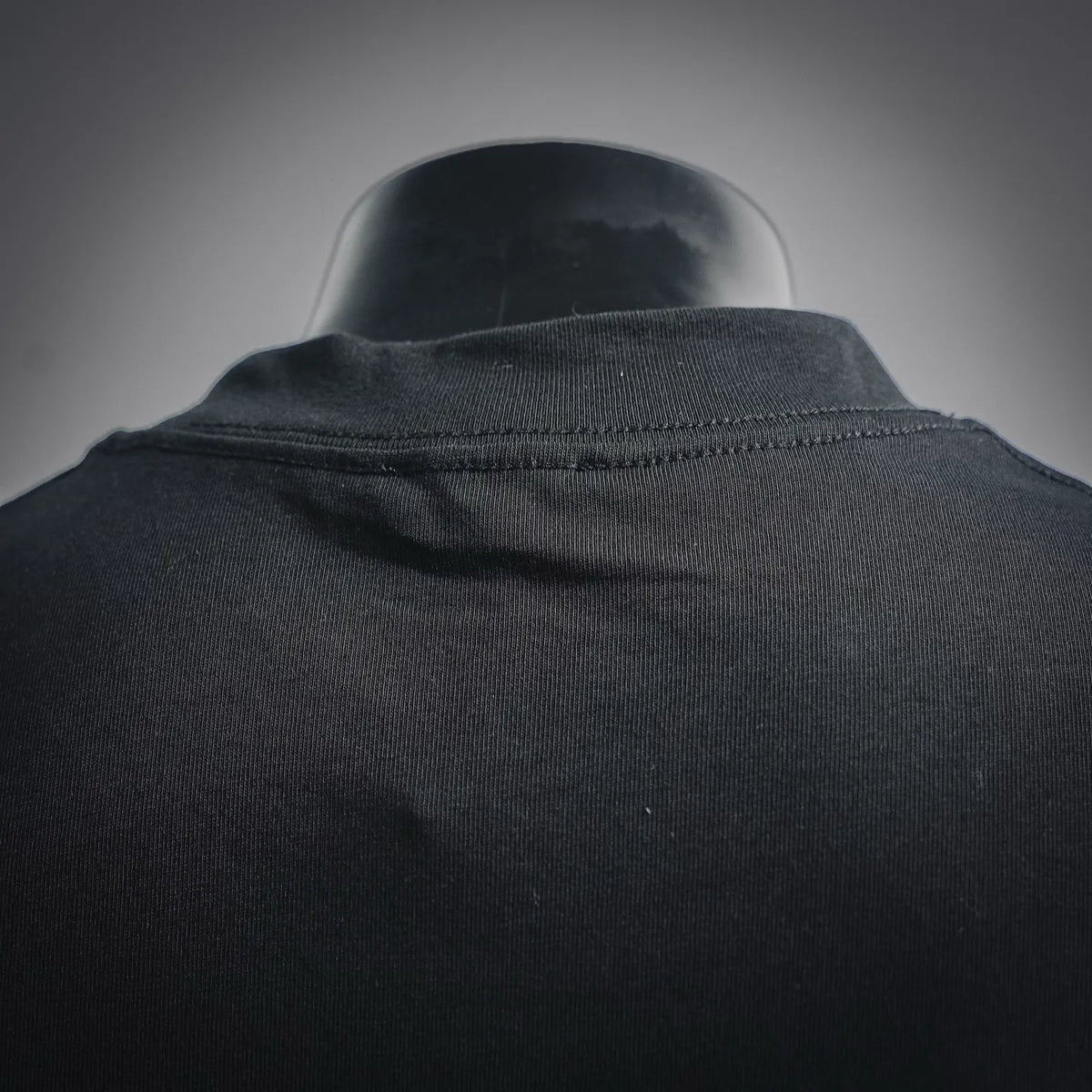 Black Dior crewneck T-shirt collar and neckline ribbed trim close-up