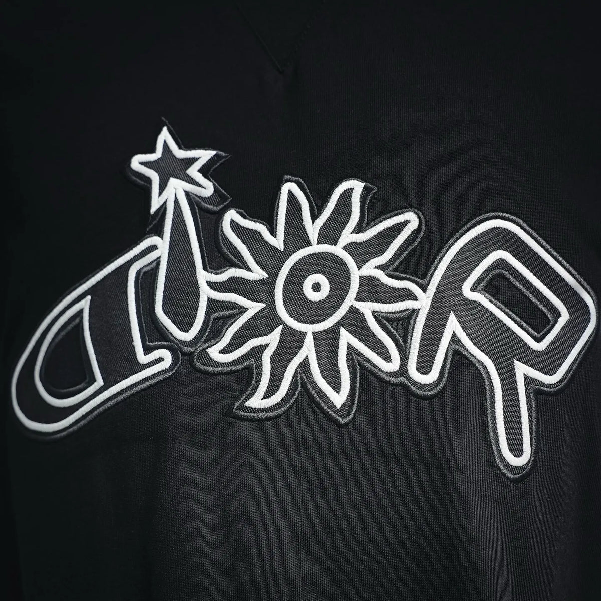 Black Dior crewneck T-shirt with oversized white outlined graphic on chest