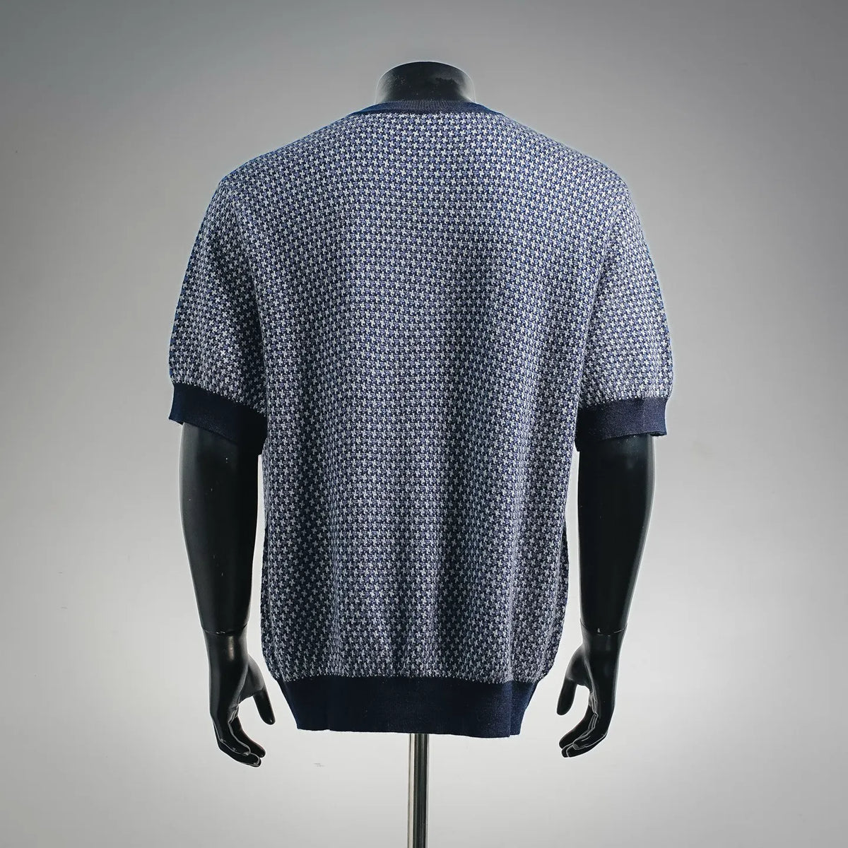 Men's short-sleeve crewneck sweater, back view with blue and white houndstooth knit
