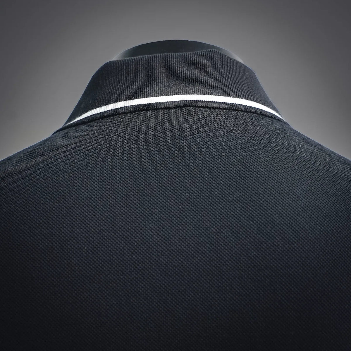 Dior dark polo shirt collar with white-and-black striped trim, ribbed knit detail
