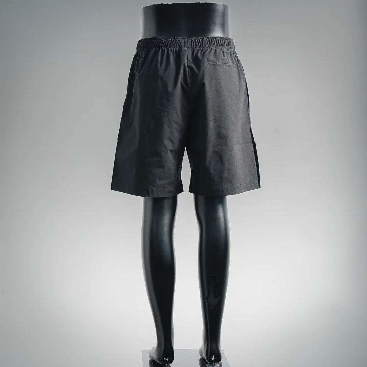Black drawstring waist shorts, relaxed fit, with visible back panel