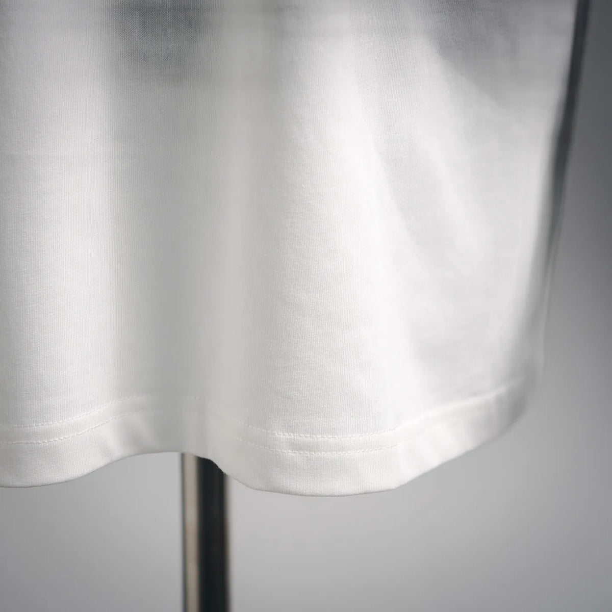 White Dior T-shirt hem and stitching detail
