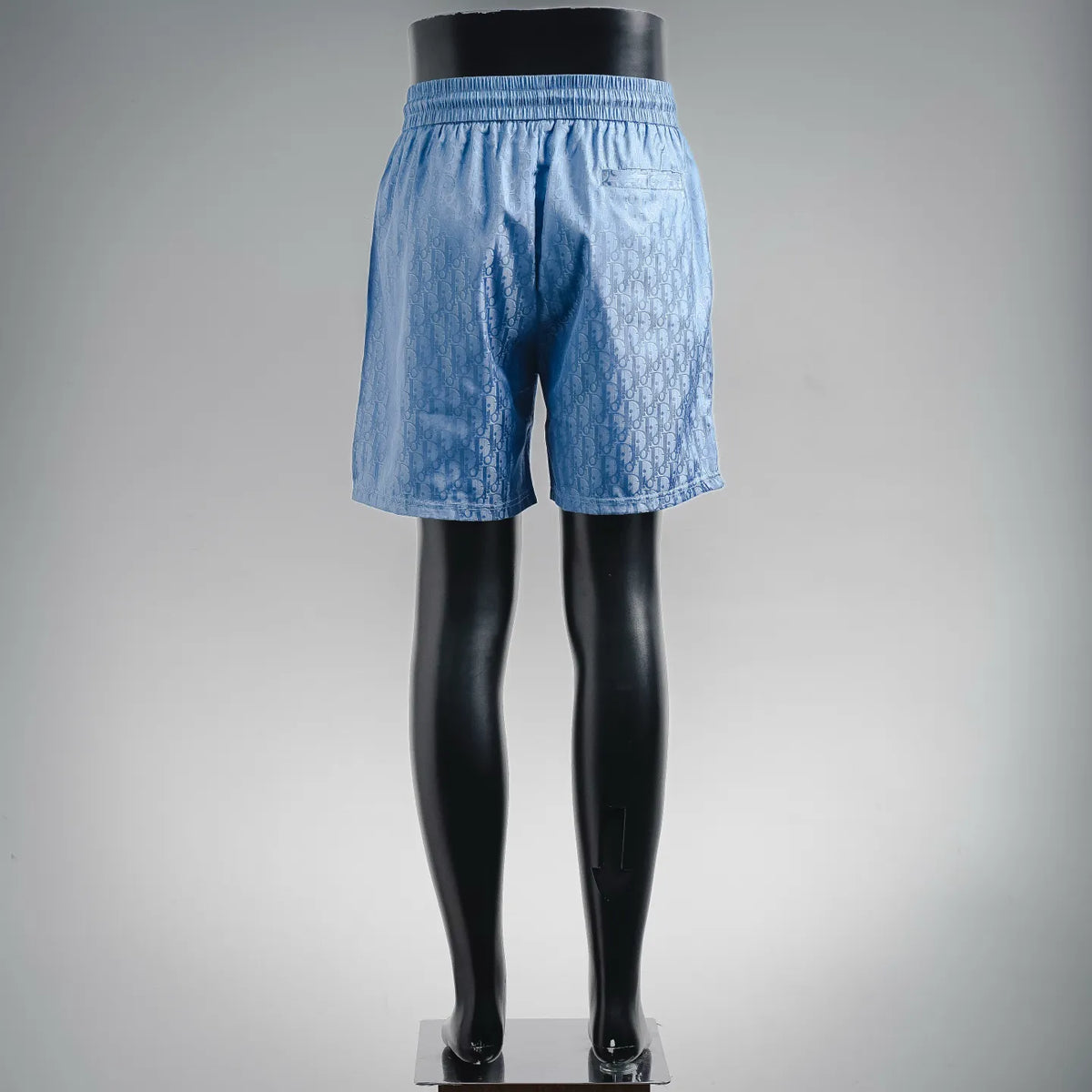 Dior light blue drawstring shorts with elastic waistband, back view