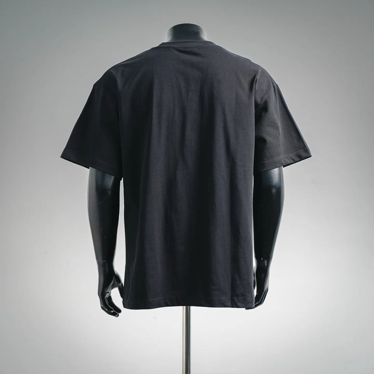 Dior short-sleeve T-shirt back view on mannequin, dark gray crew neck