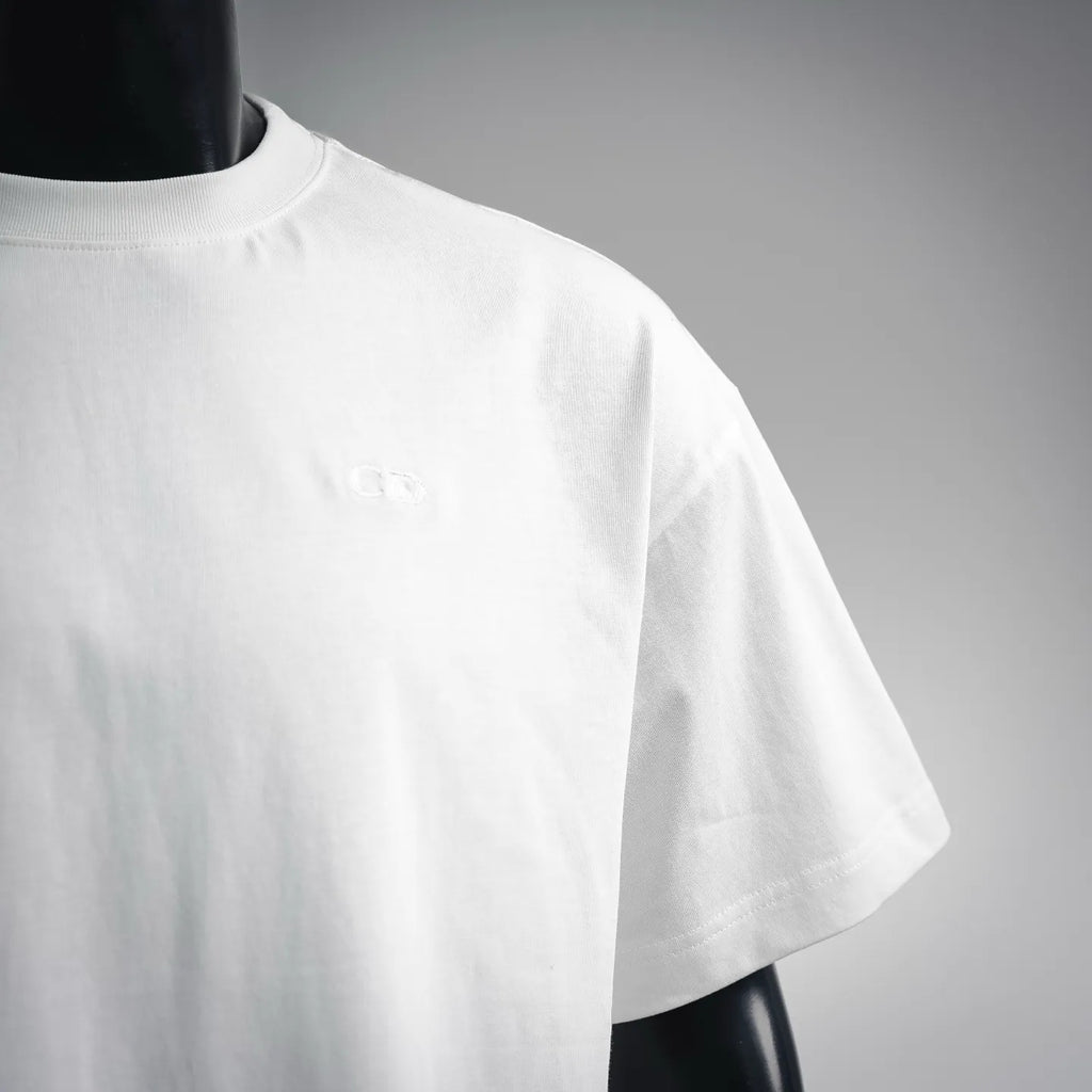 White short-sleeve t-shirt with small embossed Dior logo on chest