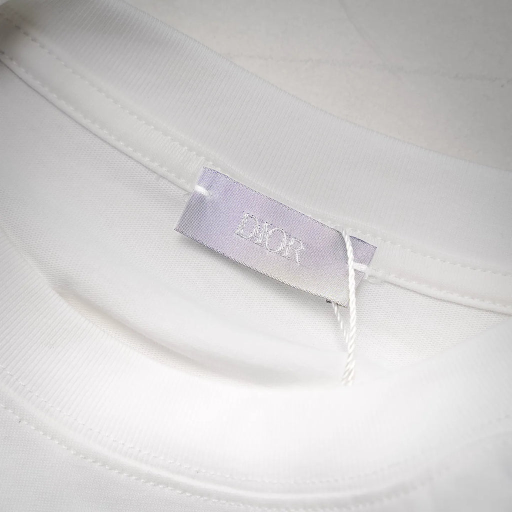 White t-shirt interior neck label with Dior branding