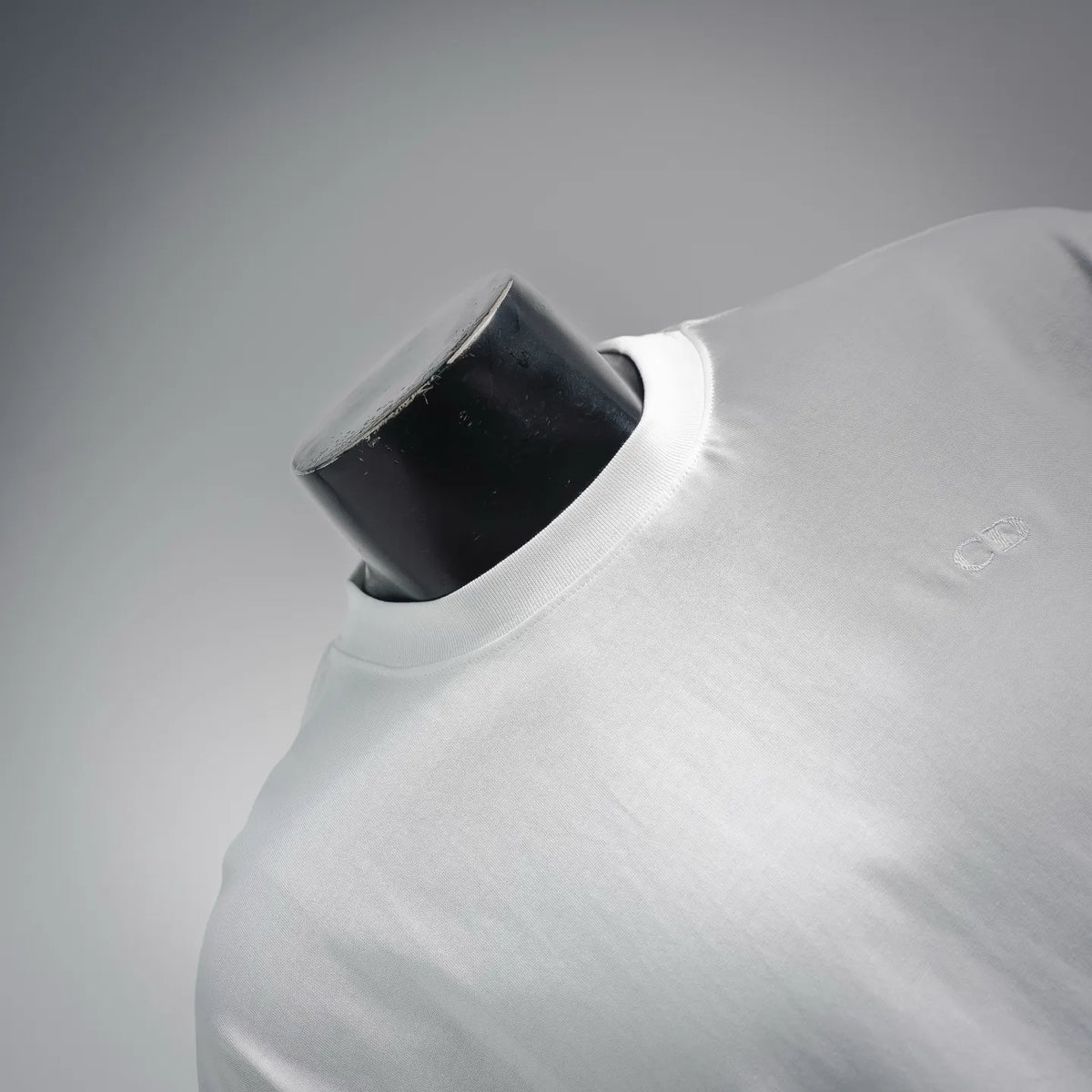 White t-shirt collar and shoulder on a mannequin