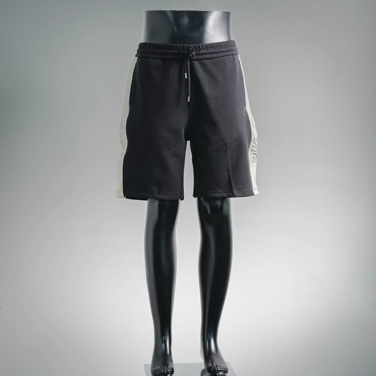 Black drawstring waist shorts with front zip fly and side pockets